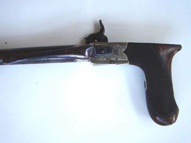An English percussion 'boot' pistol by William Westley Richards, Gunmaker to Prince Albert, circa 1840-1850. — image 4